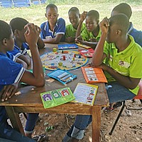 Young girls playing Dipeo at Trax youth project in Northern Ghana